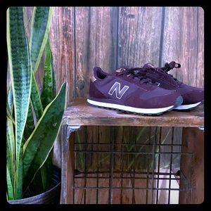 New Balance sneakers.